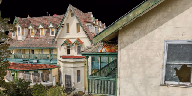 A detailed 3D photogrammetry model of an abandoned, multi-story Victorian-style building with a complex red-tiled roof, green wooden balconies, and weathered white walls against a black background.